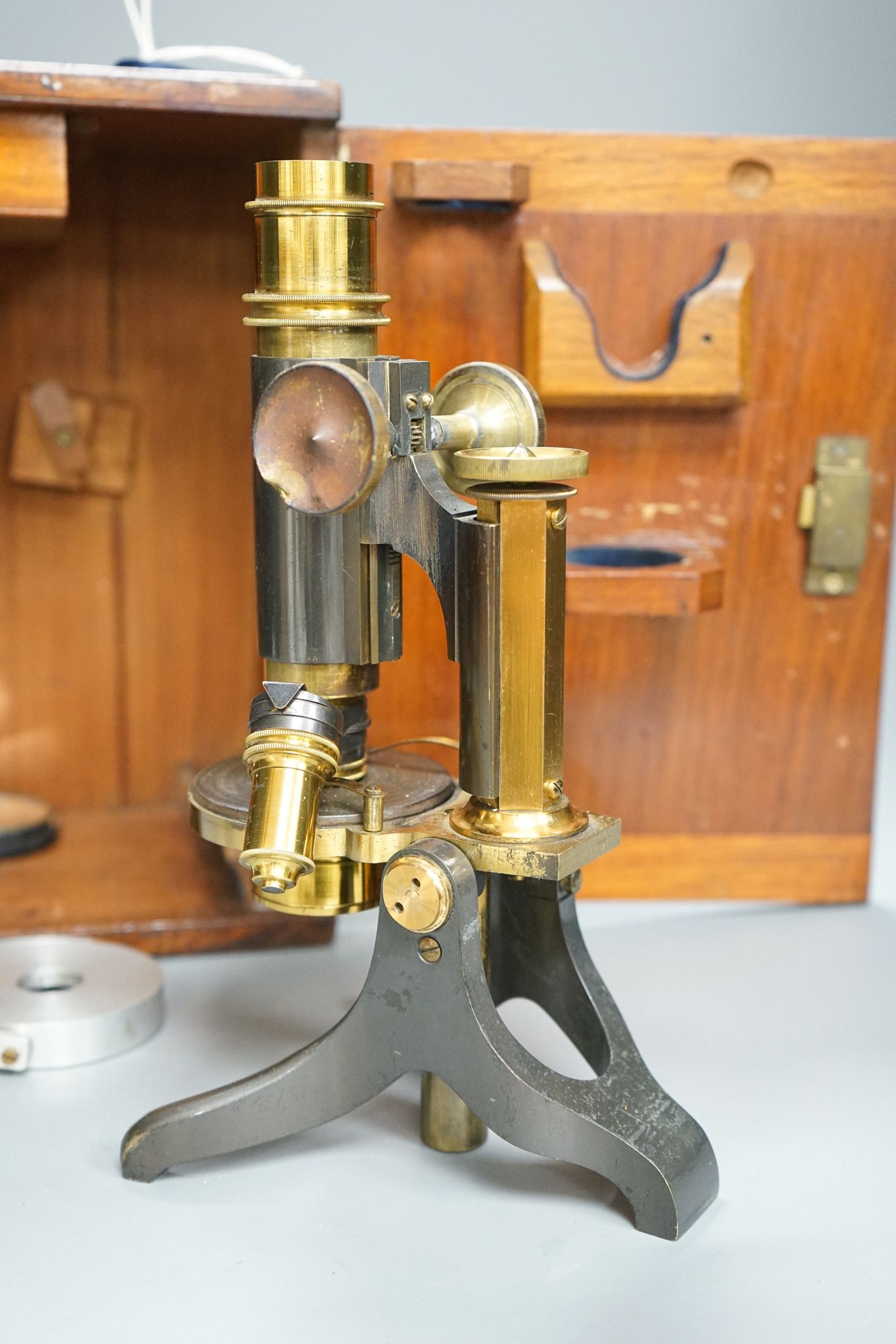 A Victorian microscope, in a mahogany case